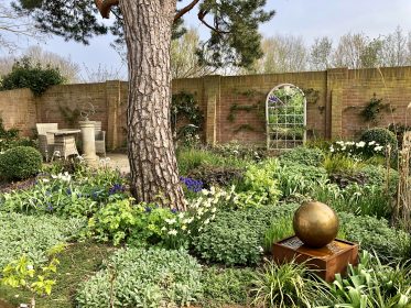 Walled garden, Sun dial, Cottage garden, Water feature, Seating area, Lush planting