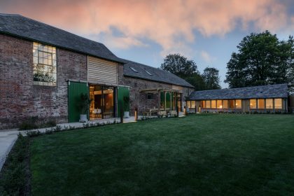 Minimalist garden design with an English garden twist for a holiday let farm complex, Eastry, Kent, UK, Mark Lane Designs, barn conversion night shot