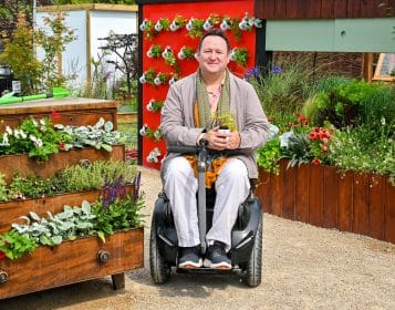 Photograph of Mark Lane from the RHS-BBC Morning Live Budget-friendly Feature Garden at RHS Hampton Court Palace Garden Festival 2023, designed by Mark Lane from Mark Lane Designs Ltd